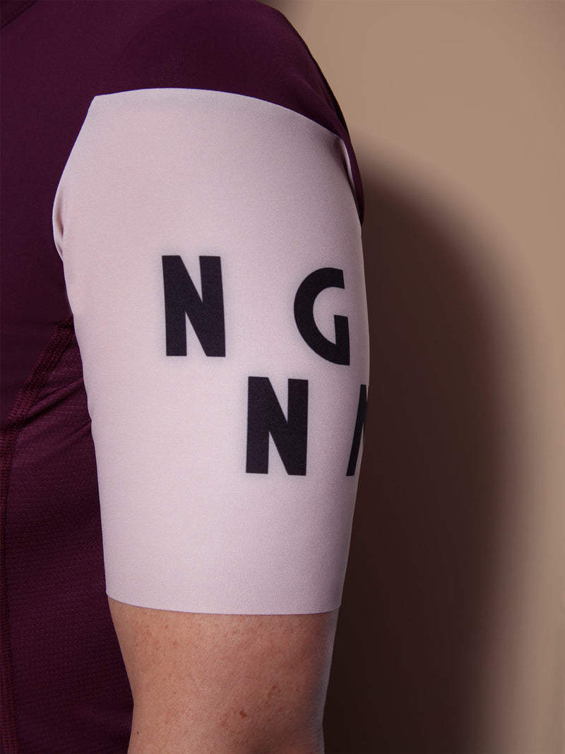 NGNM Performance Jersey Purple Aubergine detail sleeve logo